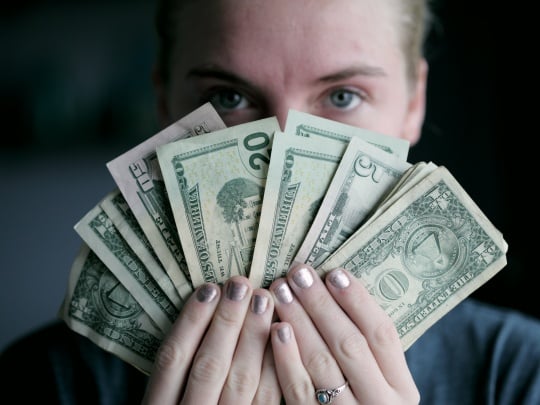 women inheritance, a person holding money