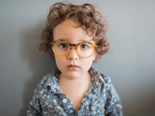 Allah the name of God, a kid with glasses