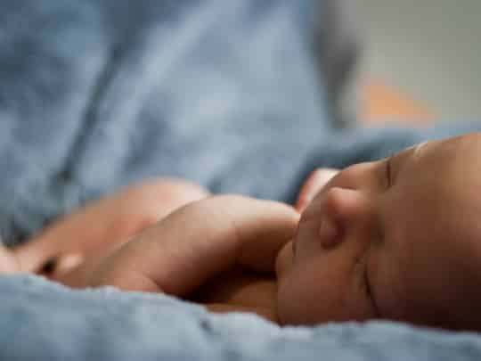 security in Islam, calm baby with a blanket