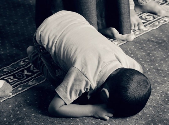 A praying kid, God is The Pardoner.