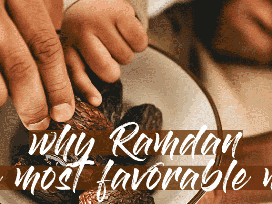 father & son breaking fast in Ramadan by eating dates